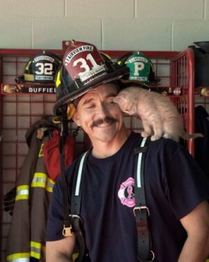 HE PULLED HER OUT OF A BURNING BUILDING—AND THEN SHE NEVER LEFT HIS SHOULDER